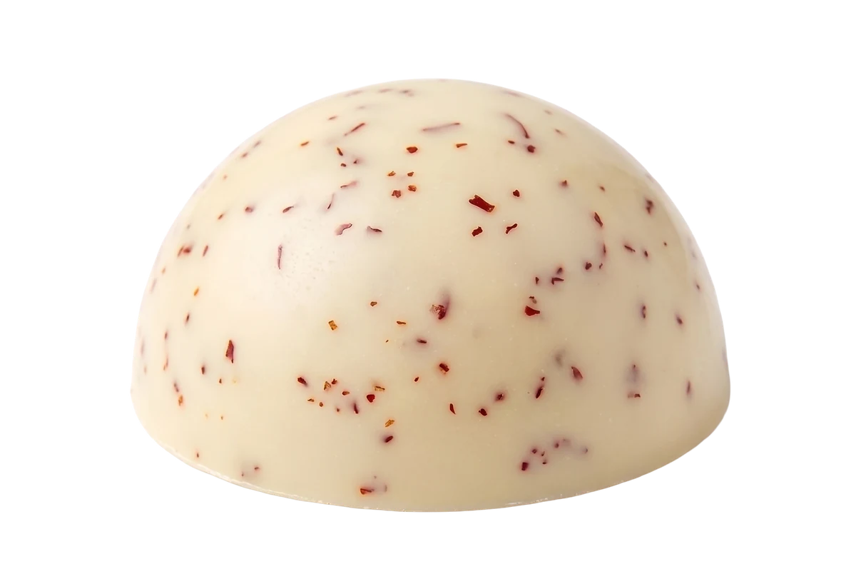 Whole Karak bonbon with saffron threads on top