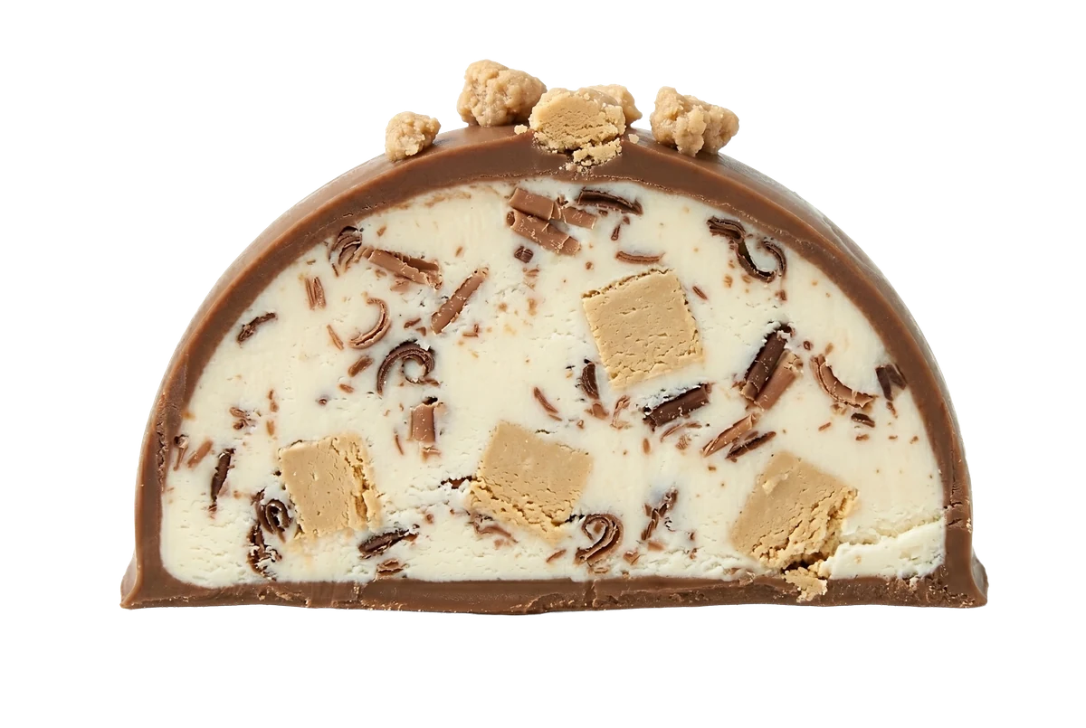 Original bonbon cut in half, revealing tahini gelato with chocolate flakes inside